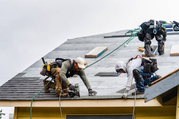 Professional Gutter Installation technician working in Carlton, OR